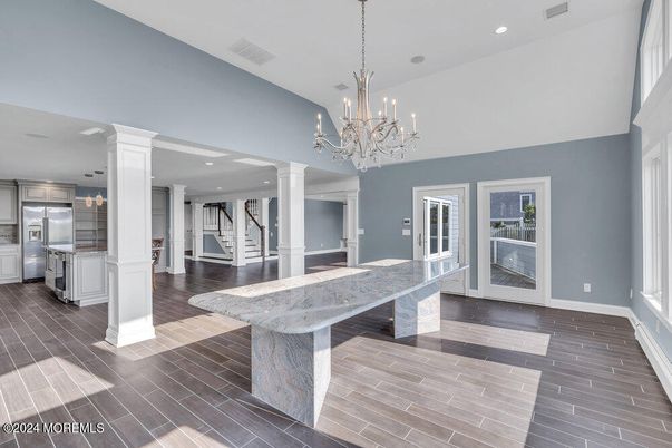 Chandelier, Interior, Kitchen, Recessed Lighting, Stainless Steel Appliances, Wood Texture Flooring