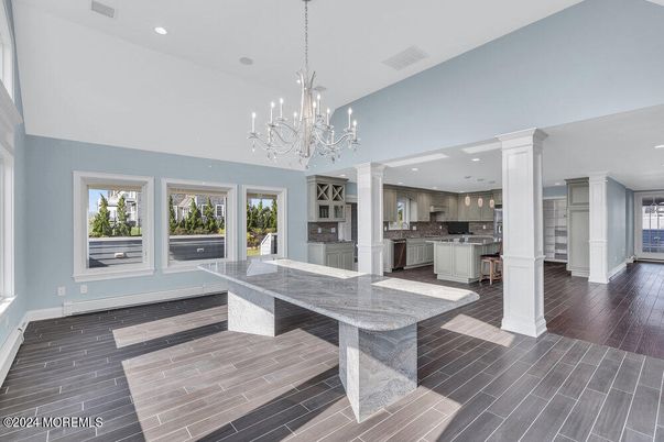 Chandelier, Interior, Kitchen, Recessed Lighting, Stainless Steel Appliances, Wood Texture Flooring