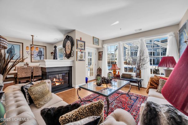 Dining room, Fireplace, Interior, Living room, Pendant Lights, Recessed Lighting, Wood Texture Flooring