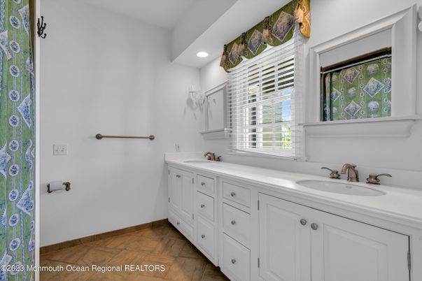 Bathroom, Dual Sink Vanities, Interior, Recessed Lighting, Wood Texture Flooring