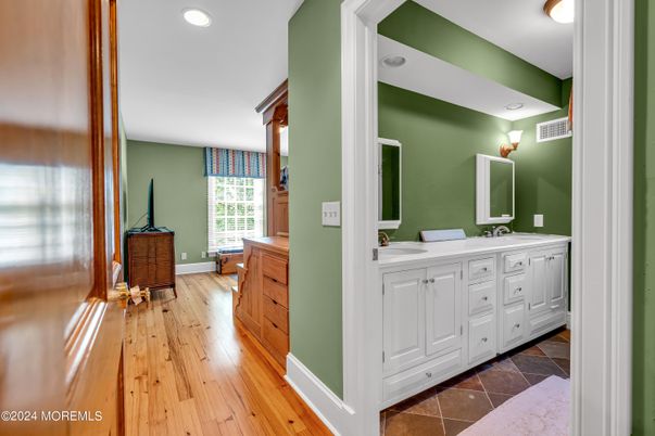 Bathroom, Dual Sink Vanities, Interior, Recessed Lighting, Wood Texture Flooring