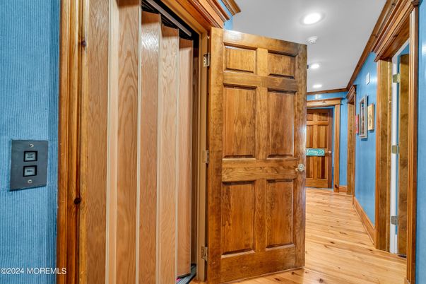 Elevator, Interior, Recessed Lighting, Wood Texture Flooring