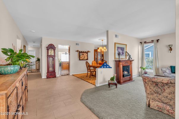 Chandelier, Dining room, Fireplace, Interior, Living room