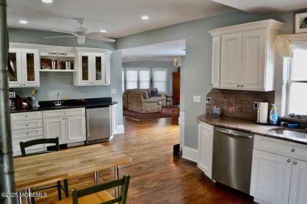 Dining room, Interior, Kitchen, Living room, Recessed Lighting, Stainless Steel Appliances, Wood Texture Flooring