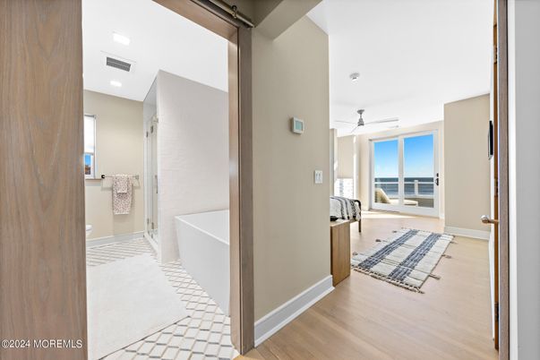 Bathroom, Free Standing Baths, Interior, Recessed Lighting, Wood Texture Flooring