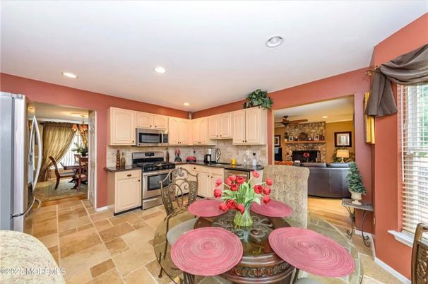 Dining room, Fireplace, Interior, Kitchen, Living room, Recessed Lighting, Stainless Steel Appliances