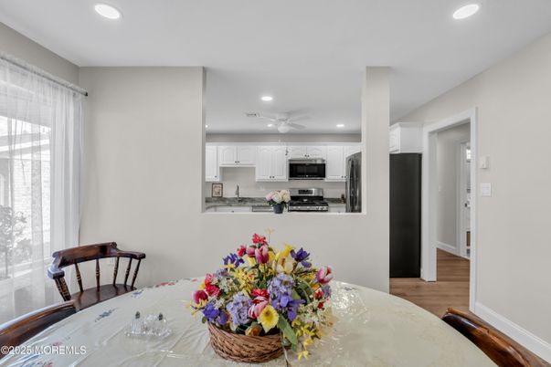 Dining room, Interior, Kitchen, Recessed Lighting, Stainless Steel Appliances, Wood Texture Flooring