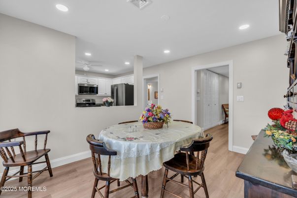 Dining room, Interior, Kitchen, Recessed Lighting, Stainless Steel Appliances, Wood Texture Flooring