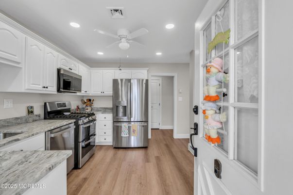 Interior, Kitchen, Recessed Lighting, Stainless Steel Appliances, Wood Texture Flooring