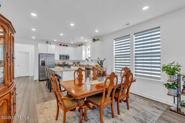 Dining room, Interior, Kitchen, Recessed Lighting, Stainless Steel Appliances, Wood Texture Flooring