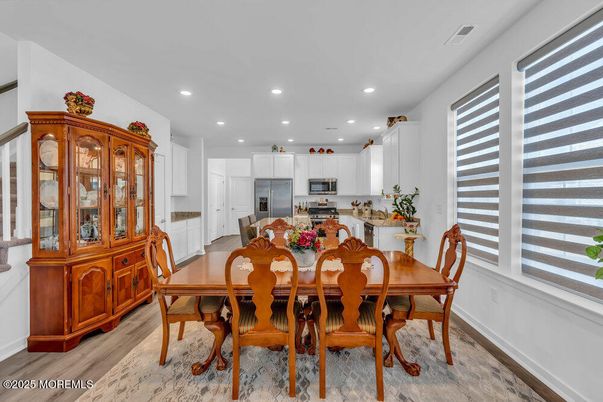 Dining room, Interior, Kitchen, Recessed Lighting, Stainless Steel Appliances, Wood Texture Flooring