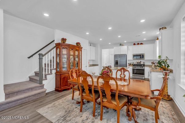 Dining room, Interior, Kitchen, Recessed Lighting, Stainless Steel Appliances, Wood Texture Flooring