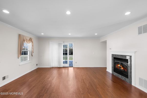 Empty room, Fireplace, Interior, Recessed Lighting, Wood Texture Flooring