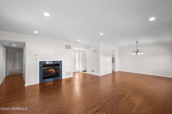 Empty room, Fireplace, Interior, Pendant Lights, Recessed Lighting, Wood Texture Flooring