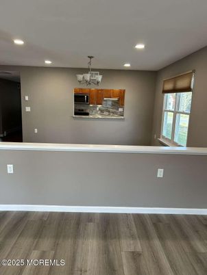Chandelier, Empty room, Interior, Recessed Lighting, Wood Texture Flooring