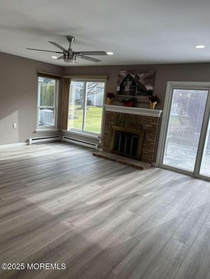 Empty room, Fireplace, Interior, Recessed Lighting, Wood Texture Flooring