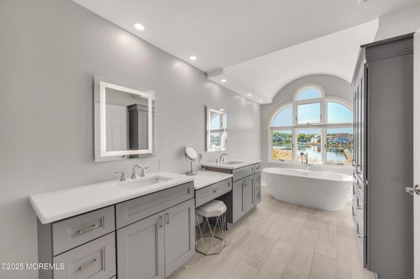 Bathroom, Dual Sink Vanities, Free Standing Baths, Interior, Recessed Lighting, Water, Wood Texture Flooring