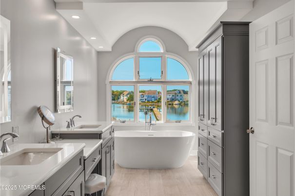 Bathroom, Dual Sink Vanities, Free Standing Baths, Interior, Recessed Lighting, Water, Wood Texture Flooring