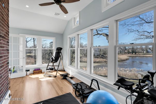 Fitness Equipment, Interior, Recessed Lighting, Stone Walls, Water, Wood Texture Flooring
