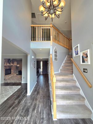 Chandelier, Fireplace, Interior, Recessed Lighting, Wood Texture Flooring