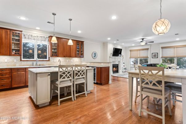 Dining room, Fireplace, Interior, Kitchen, Pendant Lights, Recessed Lighting, Wood Texture Flooring