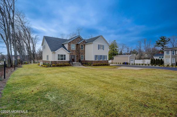 Attached, Backyard, Exterior, Facade, Brick Facade, Cape Cod