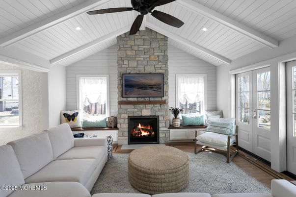 Fireplace, Interior, Living room, Recessed Lighting, Stone Walls, Wood Texture Flooring
