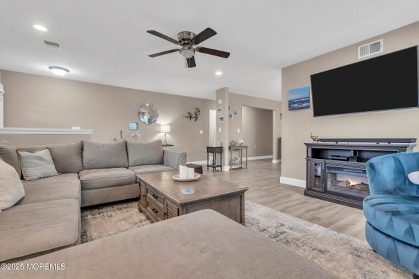 Fireplace, Interior, Living room, Recessed Lighting, Wood Texture Flooring