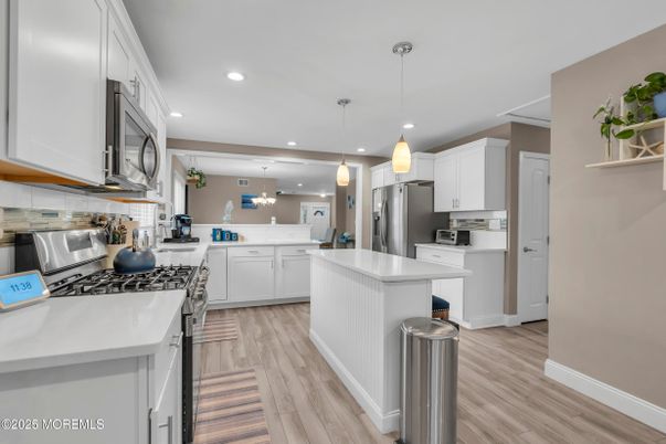 Interior, Kitchen, Pendant Lights, Recessed Lighting, Stainless Steel Appliances, Wood Texture Flooring