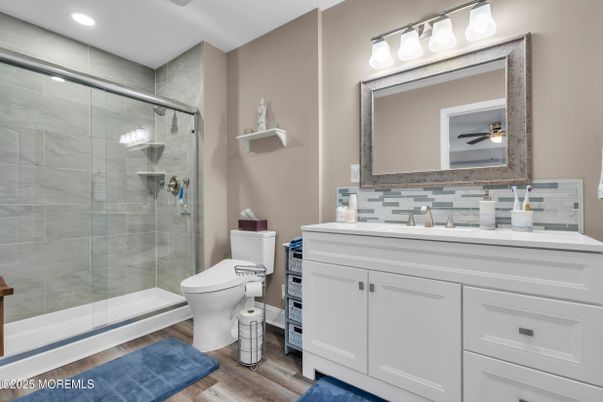 Bathroom, Glass Shower, Interior, Recessed Lighting, Wood Texture Flooring