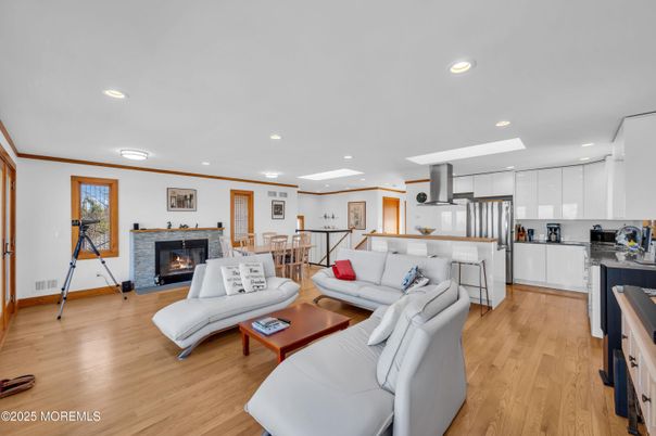 Fireplace, Interior, Kitchen, Living room, Recessed Lighting, Wood Texture Flooring