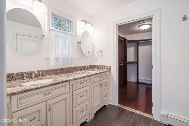 Bathroom, Dual Sink Vanities, Interior, Walk-in Closets, Wood Texture Flooring