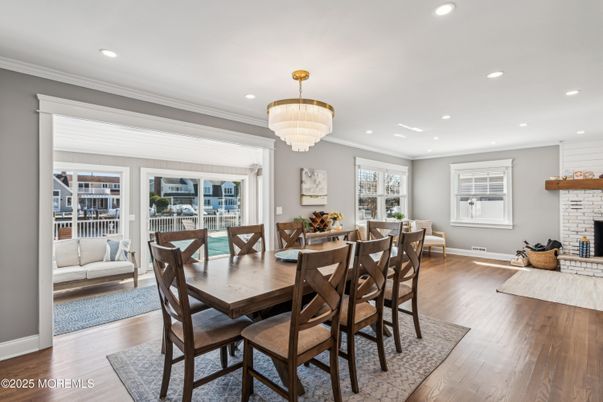 Chandelier, Dining room, Fireplace, Interior, Recessed Lighting, Wood Texture Flooring