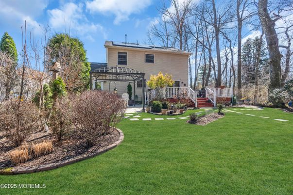 Attached, Backyard, Exterior, Facade, Solar Panels, Split Level