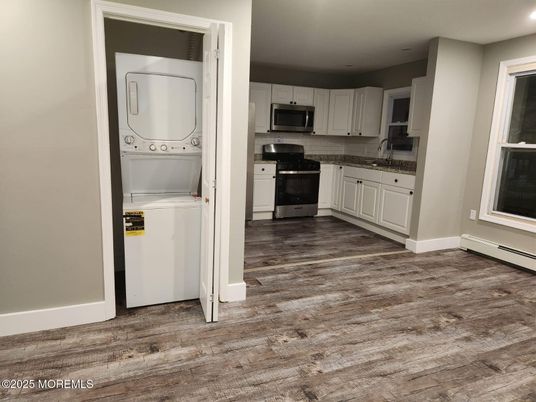 Interior, Kitchen, Recessed Lighting, Utility Closets, Washer, Wood Texture Flooring