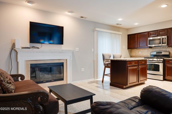 Fireplace, Interior, Kitchen, Living room, Recessed Lighting, Stainless Steel Appliances