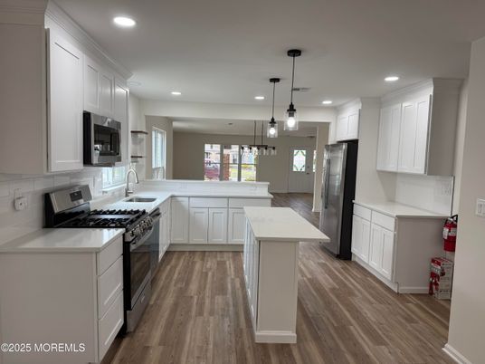 Interior, Kitchen, Pendant Lights, Recessed Lighting, Stainless Steel Appliances, Wood Texture Flooring