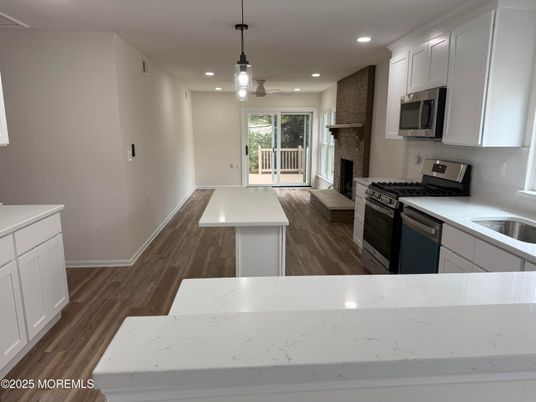 Fireplace, Interior, Kitchen, Pendant Lights, Recessed Lighting, Wood Texture Flooring