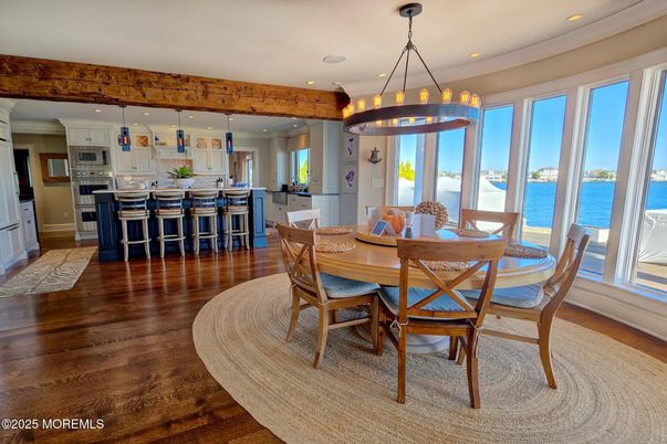 Chandelier, Dining room, Interior, Kitchen, Pendant Lights, Recessed Lighting, Water, Wood Texture Flooring