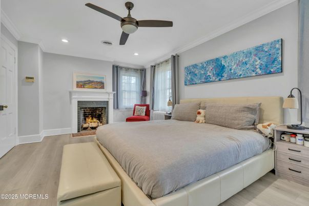 Bedroom, Fireplace, Interior, Recessed Lighting, Wood Texture Flooring