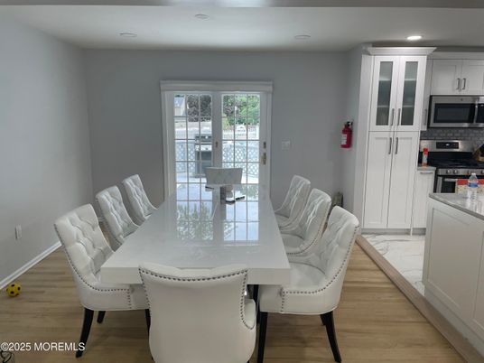 Dining room, Interior, Kitchen, Recessed Lighting, Stainless Steel Appliances, Wood Texture Flooring