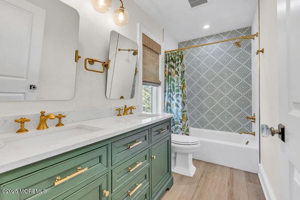 Bathroom, Dual Sink Vanities, Interior, Recessed Lighting, Wood Texture Flooring