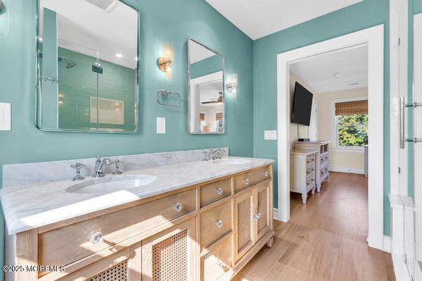 Bathroom, Dual Sink Vanities, Interior, Recessed Lighting, Wood Texture Flooring