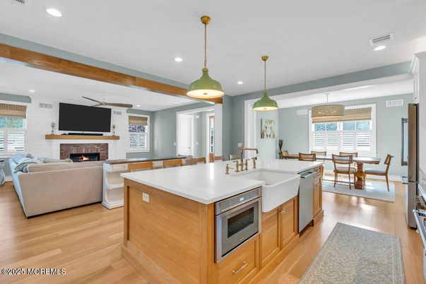 Dining room, Fireplace, Interior, Kitchen, Living room, Pendant Lights, Recessed Lighting, Wood Texture Flooring