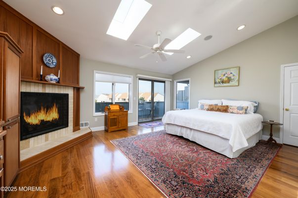 Bedroom, Fireplace, Interior, Recessed Lighting, Wood Texture Flooring