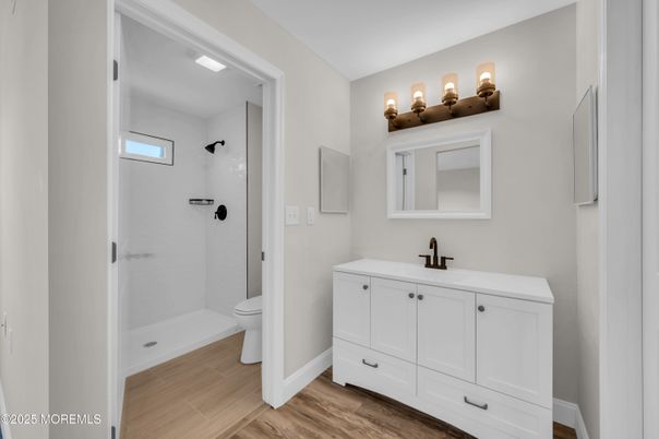 Bathroom, Glass Shower, Interior, Wood Texture Flooring