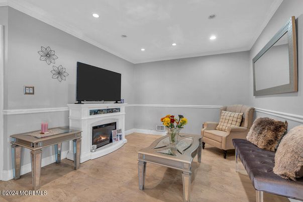 Fireplace, Interior, Living room, Recessed Lighting, Wood Texture Flooring