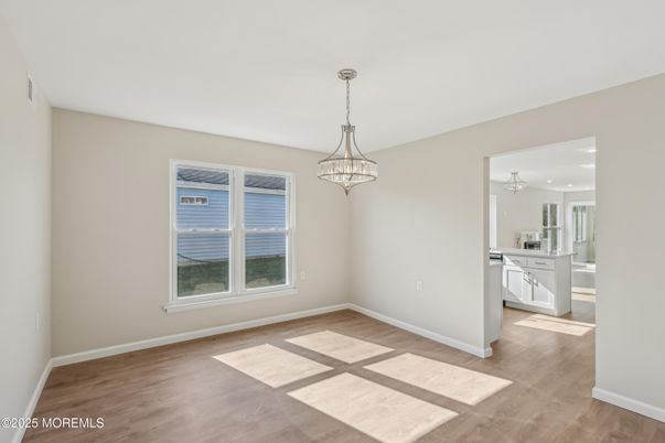 Chandelier, Empty room, Interior, Kitchen, Pendant Lights, Recessed Lighting, Wood Texture Flooring