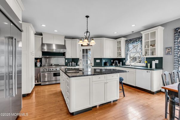 Chandelier, Interior, Kitchen, Pendant Lights, Recessed Lighting, Stainless Steel Appliances, Wood Texture Flooring
