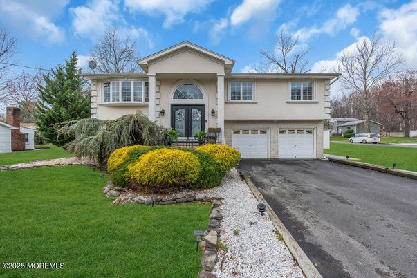 Attached, Exterior, Facade, Raised Ranch